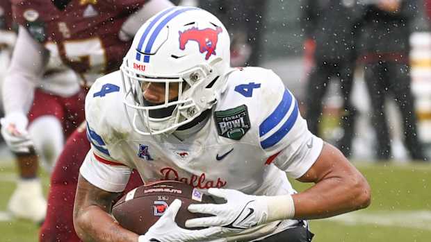 SMU running back Jaylan Knighton runs against Boston College